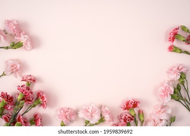 Design concept of Mother's day holiday greeting design with carnation bouquet on pastel pink table background - Shutterstock ID 1959839692