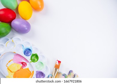 Design Concept - Preparing For Easter Celebration, Painting Easter Eggs With Colorful Acrylic Pigment Color Dyestuff In Palette, Top View, Lifestyle.