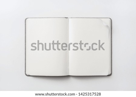 Design concept - top view of fabric hardcover notebook blank page isolated on white background for mockup. real photo, not 3D render