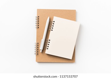 Design Concept - Top View Of Two Kraft Spiral Notebook, Blank Page, Mechanical Pencil Isolated On White Background For Mockup