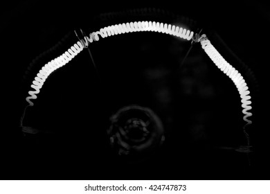 design element. Close up glowing light bulb filament