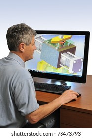 Design Engineer At Work On A Computer