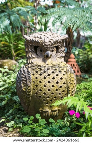 Design owl terracotta in tropical garden, owl clay sculpture for garden decoration, product of Thailand