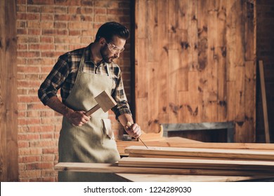 Design people person factory repair shop concept. Side profile close up photo portrait of serious confident brutal stylish concentrated skilled gifted master using metal tool loft furniture interior - Powered by Shutterstock