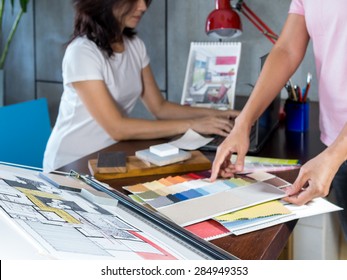 Design team working in modern Architects office - Powered by Shutterstock