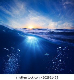design template with underwater part and sunset skylight splitted by waterline - Shutterstock ID 102961433