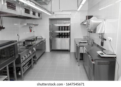 Design Of The Working Area Of The Commercial Cafe Kitchen With Stainless Steel Equipments, Hot Shop, Food Industry.