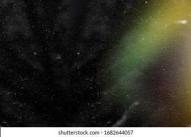 Designed film texture background with heavy grain, dust and a light leak Real Lens Flare Shot in Studio over Black Background. Easy to add as Overlay or Screen Filter over Photos overlay - Shutterstock ID 1682644057