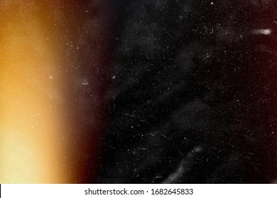 Designed film texture background with heavy grain, dust and a light leak Real Lens Flare Shot in Studio over Black Background. Easy to add as Overlay or Screen Filter over Photos overlay - Shutterstock ID 1682645833