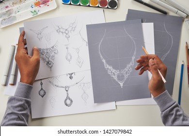 Designer design diamond jewelry drawing sketches making works craft unique handmade luxury necklaces product ideas. - Powered by Shutterstock