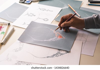 Designer design diamond jewelry drawing sketches making works craft unique handmade luxury necklaces product ideas. - Powered by Shutterstock