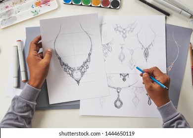Designer design diamond jewelry drawing sketches making works craft unique handmade luxury necklaces product ideas.