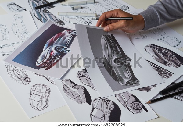 Designer engineer automotive design drawing sketch\
development Prototype concept car industrial creative.             \
                 