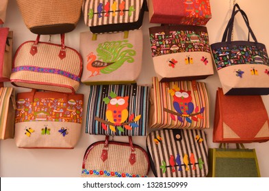 Designer jute tote bags on display at a handicraft exhibition at shop in Dilli Haat, New Delhi, India - Powered by Shutterstock