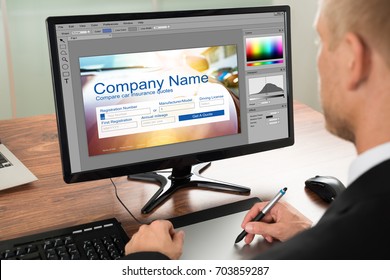 Designer Making Webpage Design On Computer Using Graphic Tablet - Powered by Shutterstock