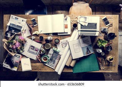 Designer Messy Workspace On Wooden Table Stock Photo 653636809 ...