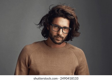 Designer, modern or portrait of man with glasses, vision or clear sight on grey background in studio. Prescription eyewear, face and confident male mode with fashion, health or cool spectacle frame - Powered by Shutterstock