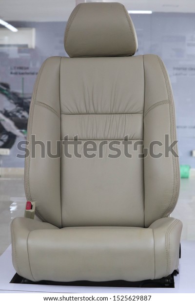 Designer Off White color Machine Stitched\
Leather Seat Cover for Car Decor and\
Services