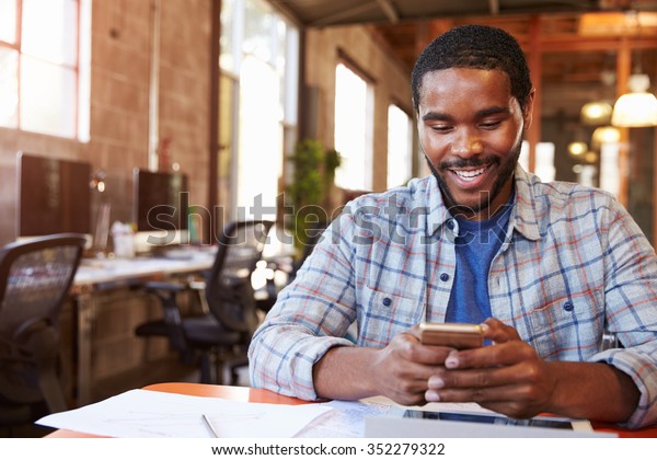 Designer Sitting Meeting Table Texting On Stock Photo (Edit Now) 352279322