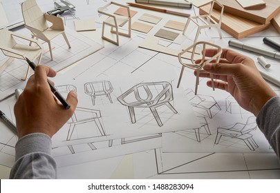 Designer sketching drawing design development product plan draft chair armchair Wingback  Interior furniture prototype manufacturing production. designer studio concept .                            - Shutterstock ID 1488283094