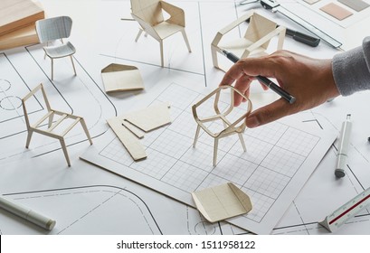 Designer sketching drawing design development product plan draft chair armchair Wingback Interior furniture prototype manufacturing production. designer studio concept .                            - Shutterstock ID 1511958122
