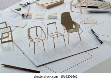 Designer sketching drawing design development product plan draft chair armchair Wingback Interior furniture prototype manufacturing production. designer studio concept .                           