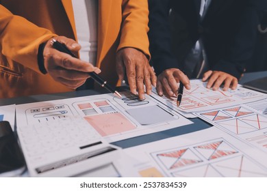 The designer team is designing the uxui system to make the uxui system work well on new phones and support system updates. Website development concept UI UX front end designer - Powered by Shutterstock