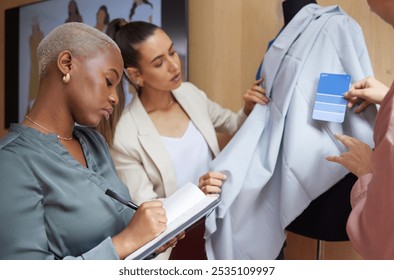 Designer, women and color palette in workshop for garment choice, textile design and material samples. Small business, teamwork and creative project for fashion week with fabric inspiration and notes - Powered by Shutterstock