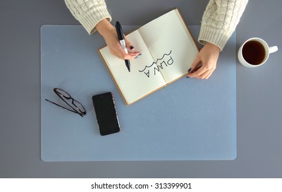 Designer working at desk using digitizer in his office