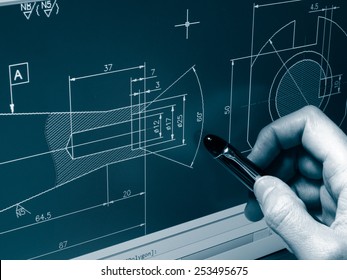 Designer Working On A Cad Blueprint Monochrome Image