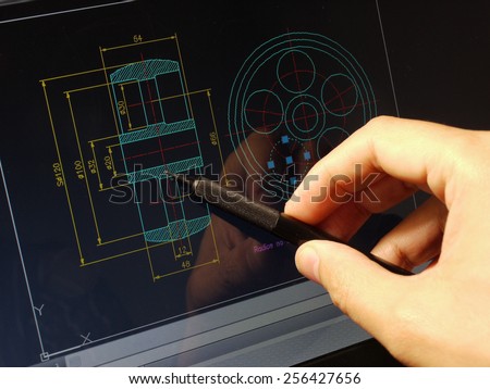 designer working on a cad blueprint 