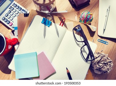 Designer's Desk with Architectural Tools and Notebook