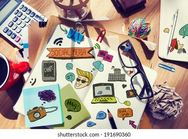 Designer's Table With Social Media Notes And Tools