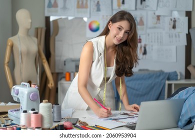 Designers are thinking of designing clothes in the cloth room as a happy work. - Powered by Shutterstock