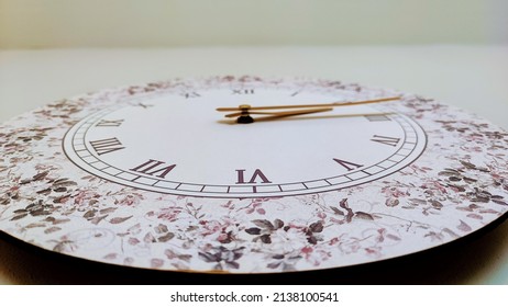 Designer's Wall Clock, Floral And In Pink Shades, Closeup Shot Weird Angle.