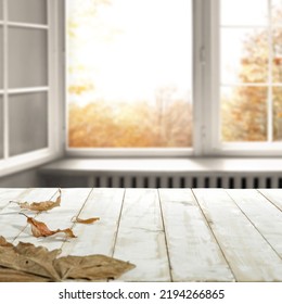 Desk of free space for your decoration and autumn window background.  - Shutterstock ID 2194266865