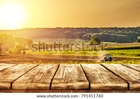 Desk of free space for your decoration and farm landscape of spring time 