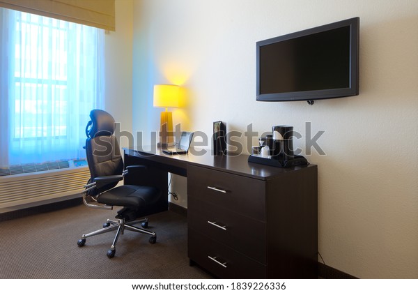 Desk at an hotel\
room.