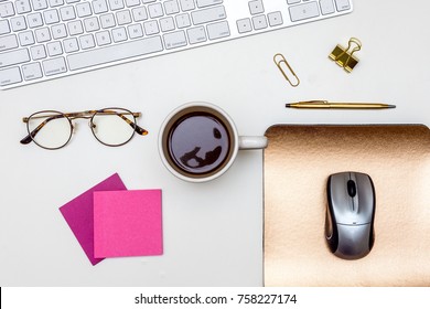Desk Office Work Coffee Glasses Pen Paper Clips Mouse Keyboard Sticky Note Freelance Coffee Mug Typing Writing White Gold From Above Overhead Flat
