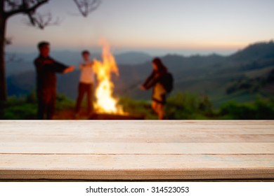 desk space and night camping in forest background. - Shutterstock ID 314523053