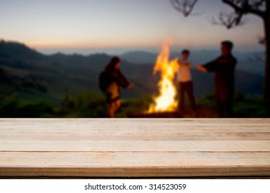 desk space and night camping in forest background. - Shutterstock ID 314523059