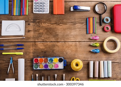 Desk With Stationary. Studio Shot On Wooden Background. 
