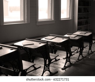 Desks And Books In Old School House
