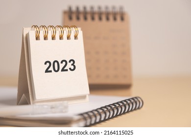 Desktop calendar for 2023 on a beige background. goals and plans on next year. - Shutterstock ID 2164115025