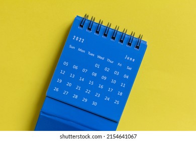 Desktop Calendar For June 2022 On A Yellow Background