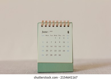 Desktop Calendar For June 2022 On The Table