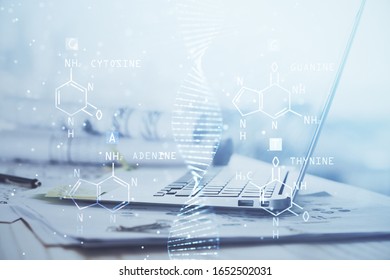 Desktop computer background and DNA drawing. Double exposure. Science concept.