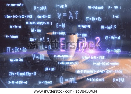 Desktop computer background and formula hologram writing. Double exposure. Education concept.