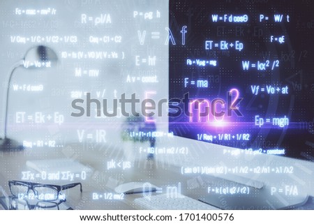 Desktop computer background and formula hologram writing. Double exposure. Education concept.