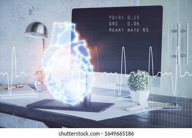 Desktop computer background and heart drawing. Double exposure. Medical study and healthcare concept.